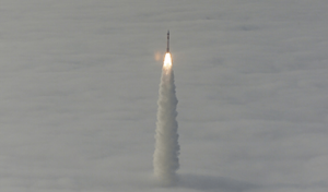 Rocket launches through marine layer