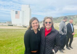 REACH President/CEO stands with GO-Biz Director Dee Dee Myers at Vandenberg Space Force Base