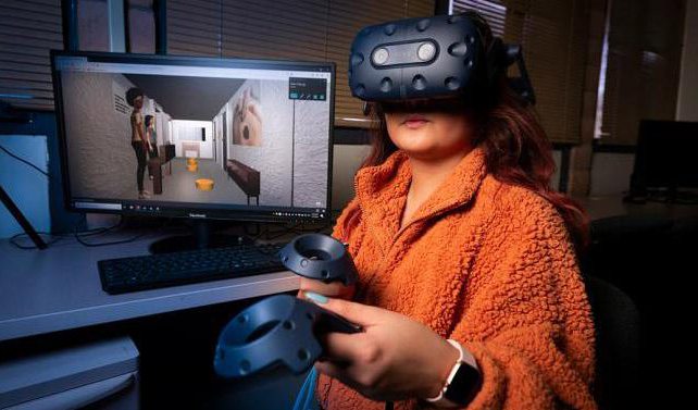 woman trains on a VR device